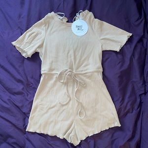 Romper never worn before with tags attached